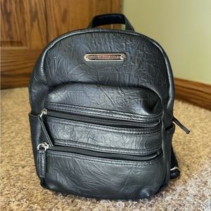 Stone Mountain faux leather small backpack. Black. Purse.